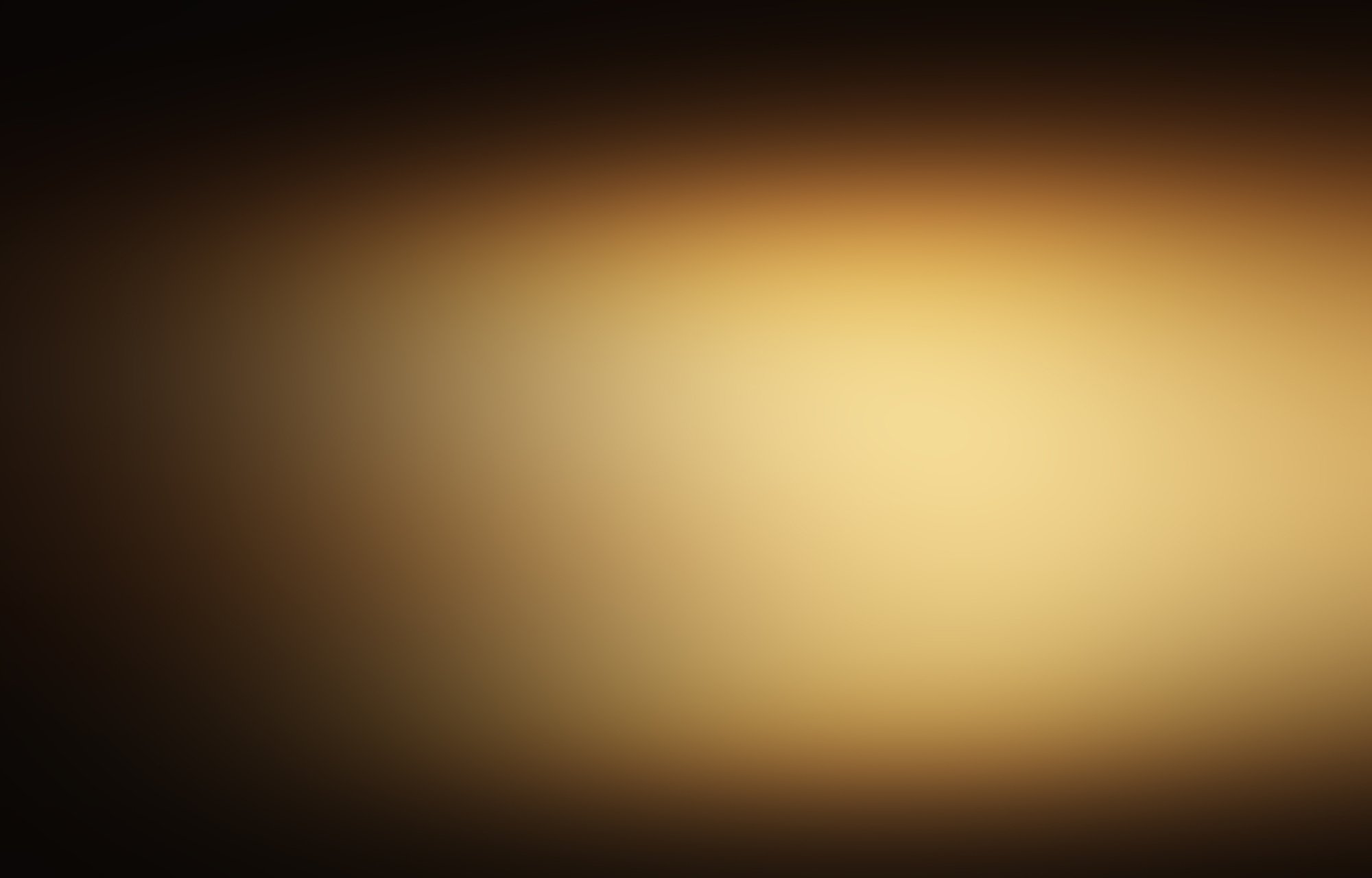 dark gold and black defocused abstract gold background